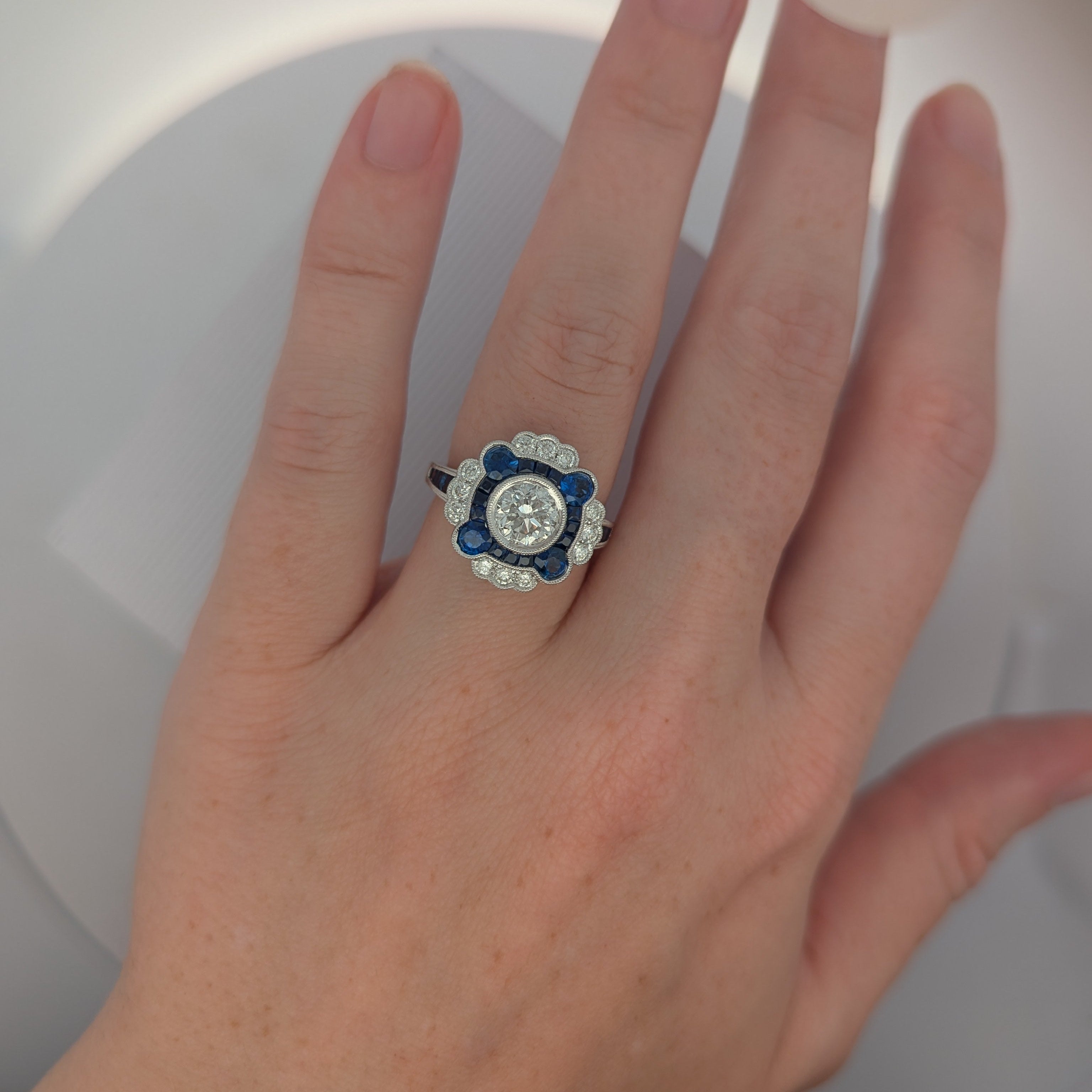 White Gold, Round Diamond, and Sapphire Cocktail Ring