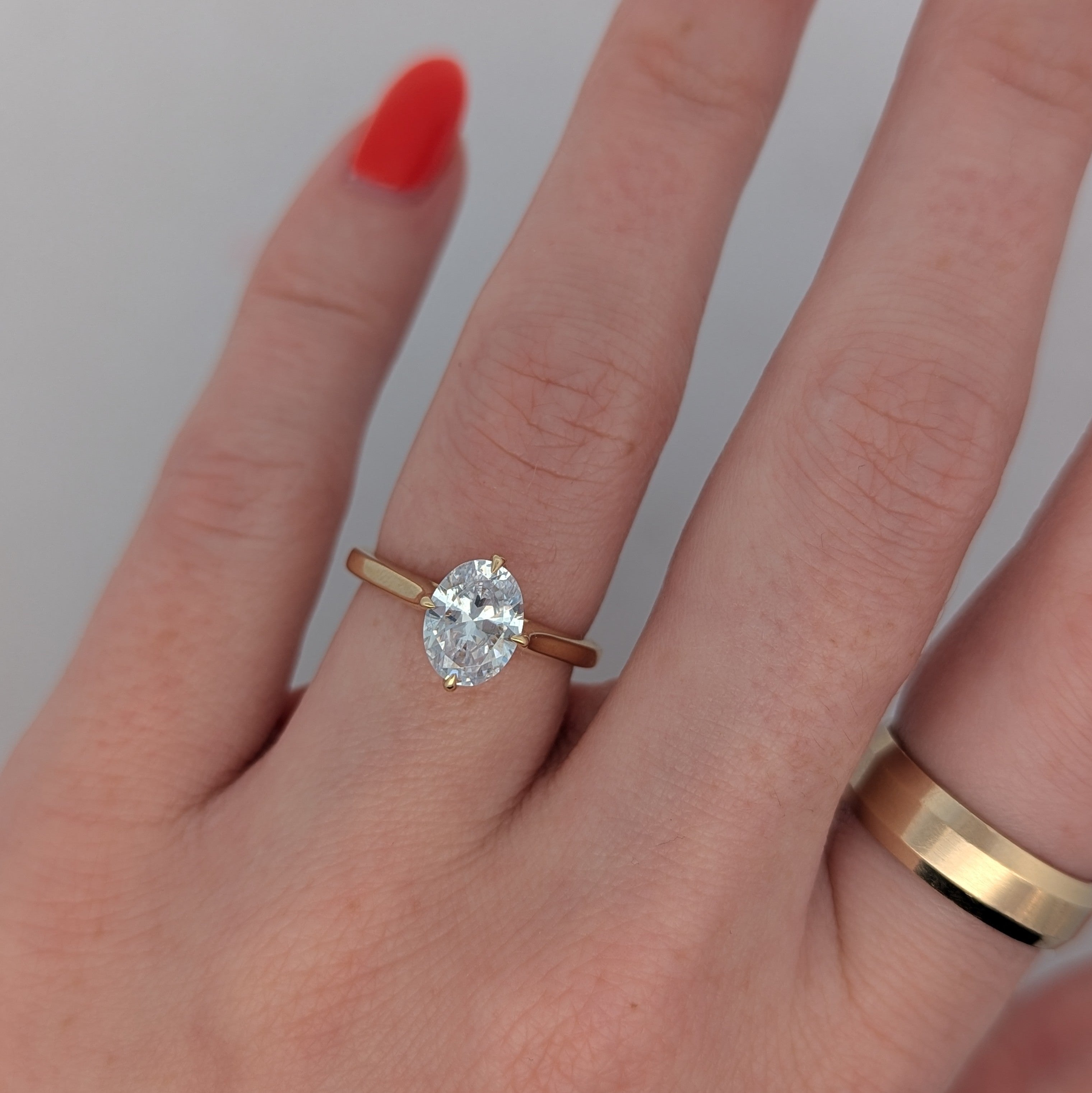 14K Gold Oval Solitaire with Hidden Halo