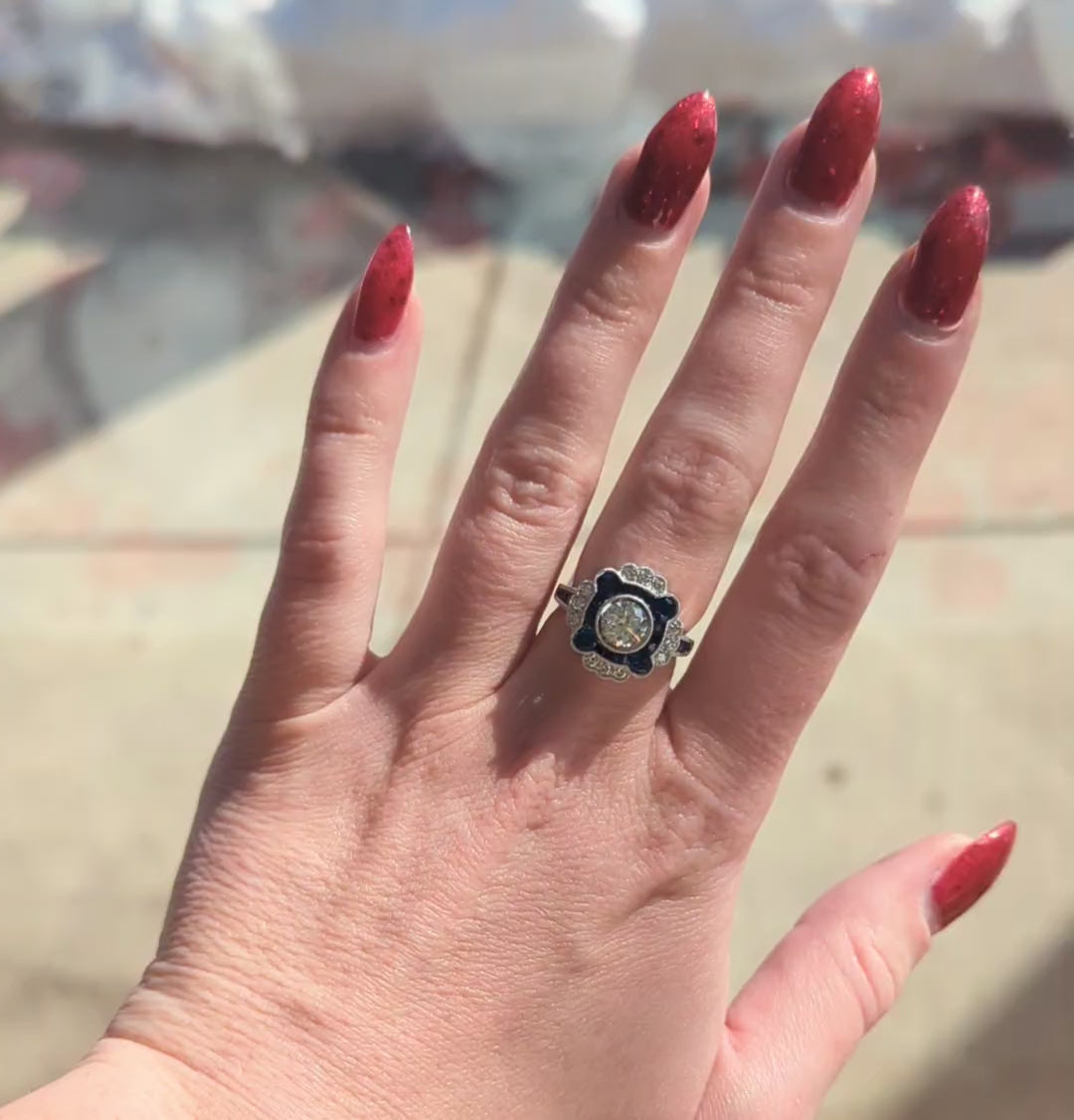 White Gold, Round Diamond, and Sapphire Cocktail Ring