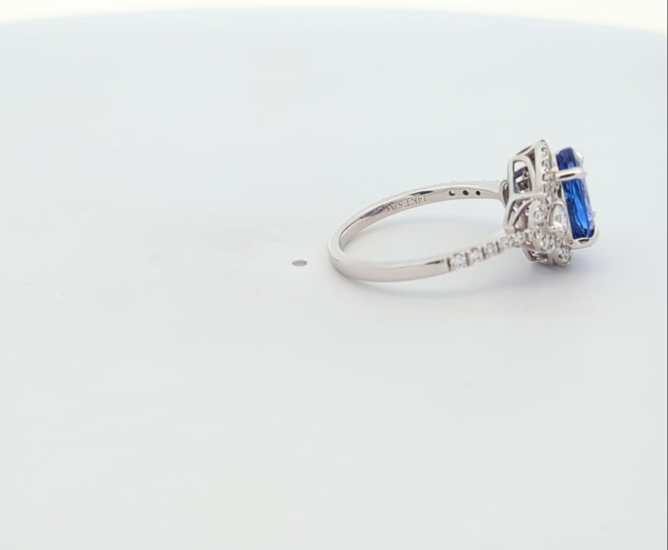 Tanzanite and Diamond Halo Ring